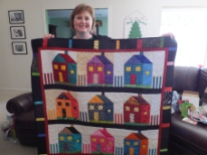 Loretta with her quilt